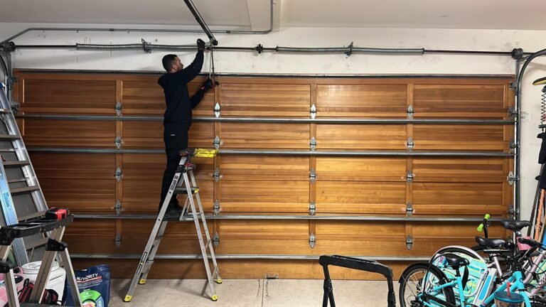 Legacy Garage Door technician on a garage door repair job