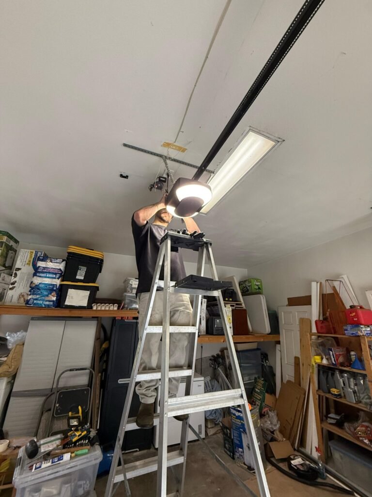 Legacy Garage Door technician on a garage door repair job