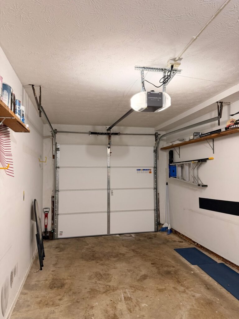Legacy Garage Door technician on a garage door repair job