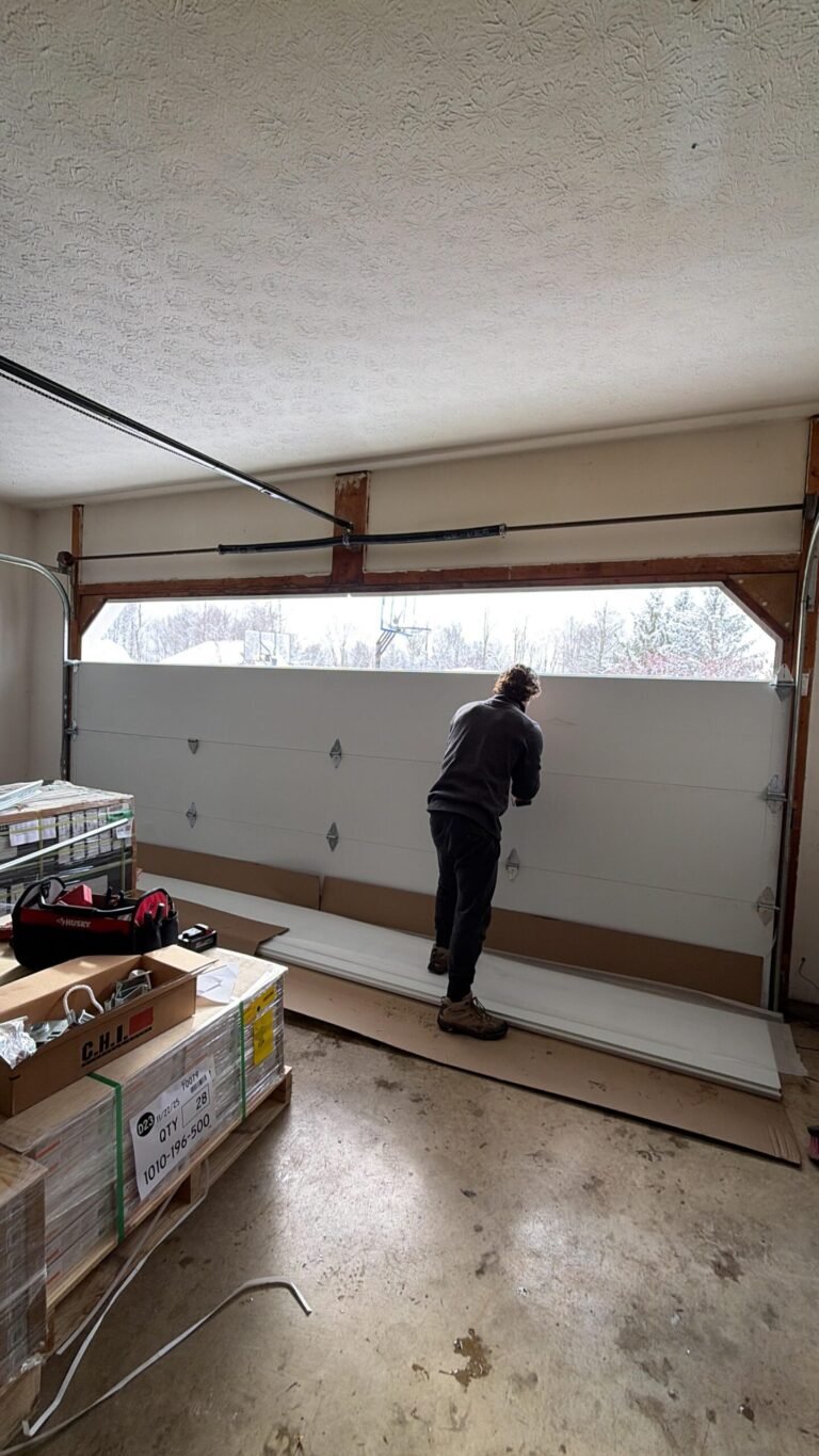 Legacy Garage Door technician on a garage door repair job