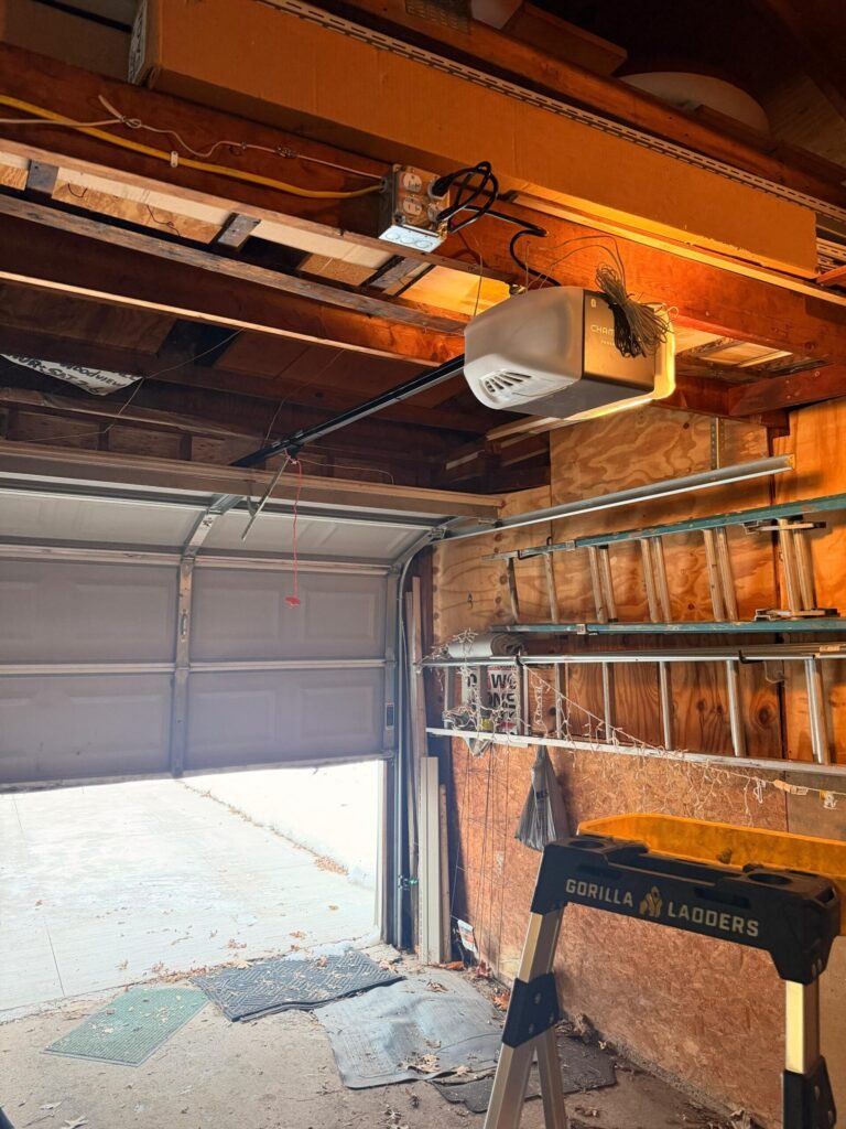 Legacy Garage Door technician on a garage door repair job