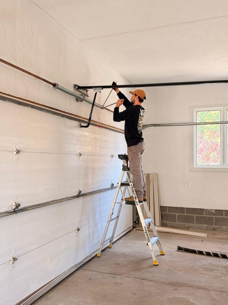 Legacy Garage Door technician on a garage door repair job