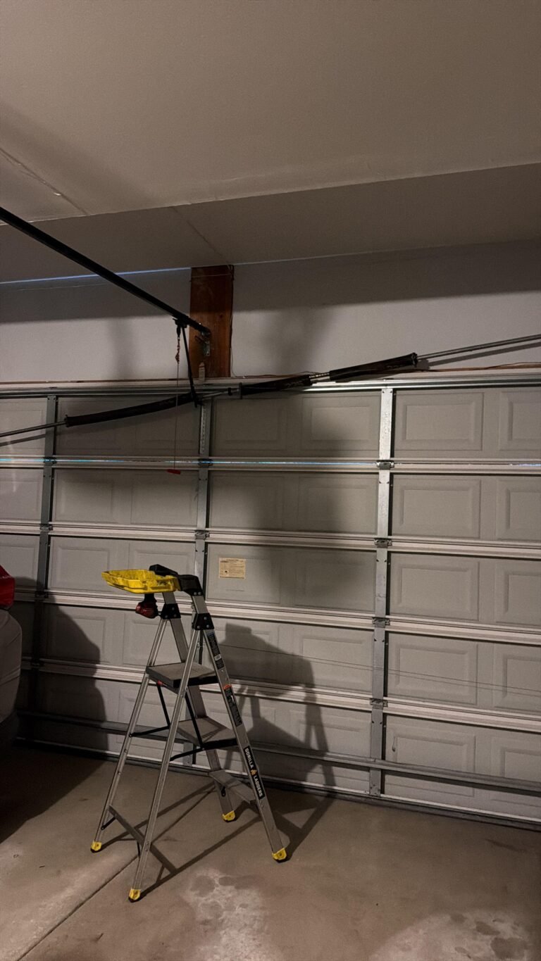 Legacy Garage Door technician on a garage door repair job